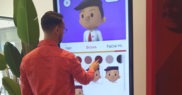 person using Exacter app on a large screen